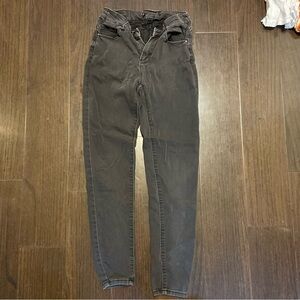 Very worn black jeans